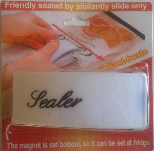 Small handy sealer with magnet attached to the bottom, so it can be set on your fridge.
