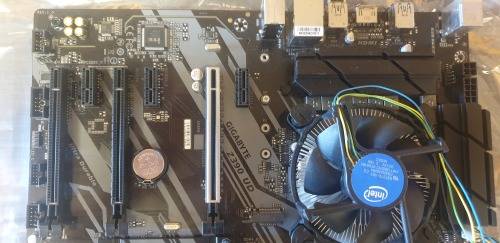 Gigabyte Z390 Ultra Durable Motherboard, intel Gold 3.7ghz CPU, 4GB RAM, 6 PCIe Slots.