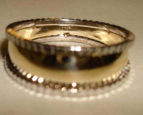 Stunning solid 9ct Yellow Gold designer wedding band with White Gold trim on edge