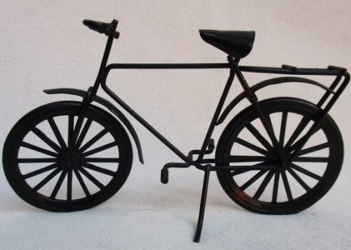 A SMALL WELL MADE METAL BICYCLE WITH MOVING WHEELS!!