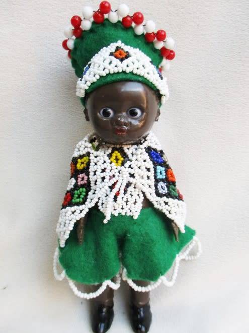 A SMALL VINTAGE BLACK DOLLY IN BEAUTIFUL NDEBELE BEADED OUTFIT AND HAT!!