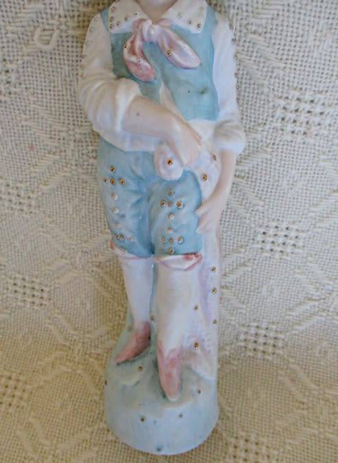 A STUNNING VINTAGE/ANTIQUE HAND PAINTED PARIAN WARE FIGURE OF BOY IN PERIOD DRESS