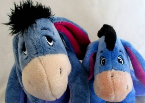 TWO CUTE EEYORES FROM WINNIE THE POOH - ONE SAD AND ONE CONTENTED