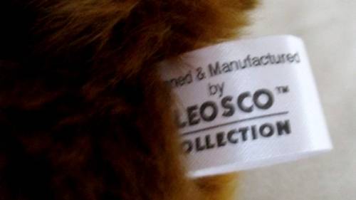 A CUTE FLUFFY LEOSCO KITTY CAT IN GREAT CONDITION WITH ORIGINAL MEDALLION AND LABEL