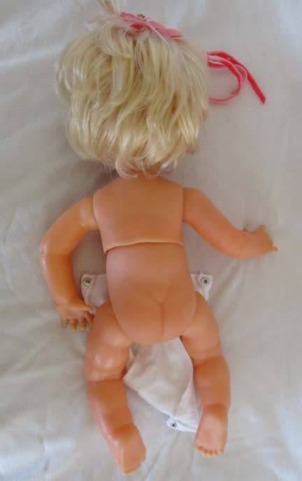 A PRETTY 44CM TALL FIRST LOVE DOLL WITH TWISTY BODY