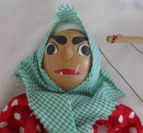 A VINTAGE WOODEN PUPPET