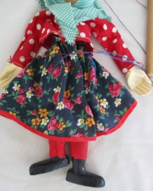 A VINTAGE WOODEN PUPPET