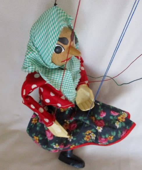A VINTAGE WOODEN PUPPET