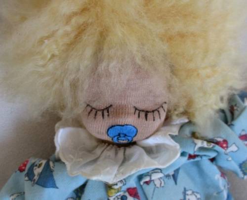 A SWEET VINTAGE MUSICAL PULL-STRING BABY DOLL IN CUTE KITTEN PJ's