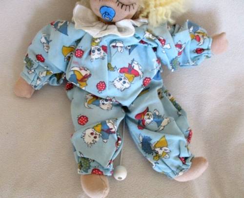 A SWEET VINTAGE MUSICAL PULL-STRING BABY DOLL IN CUTE KITTEN PJ's