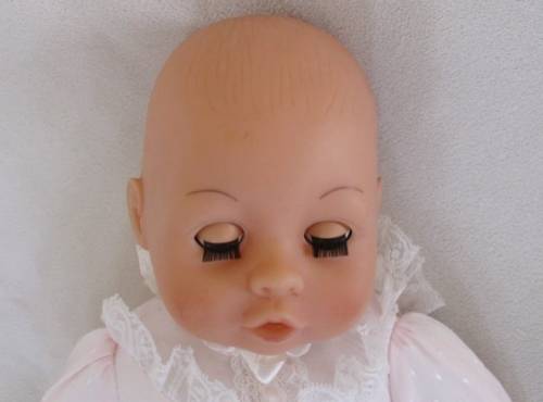 A VERY COLLECTABLE CRYING, GURGLING, COOING BATTAT BABY DOLL WITH OPEN/CLOSE EYES