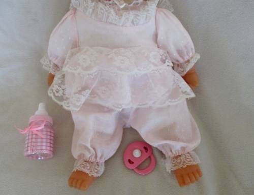 A VERY COLLECTABLE CRYING, GURGLING, COOING BATTAT BABY DOLL WITH OPEN/CLOSE EYES