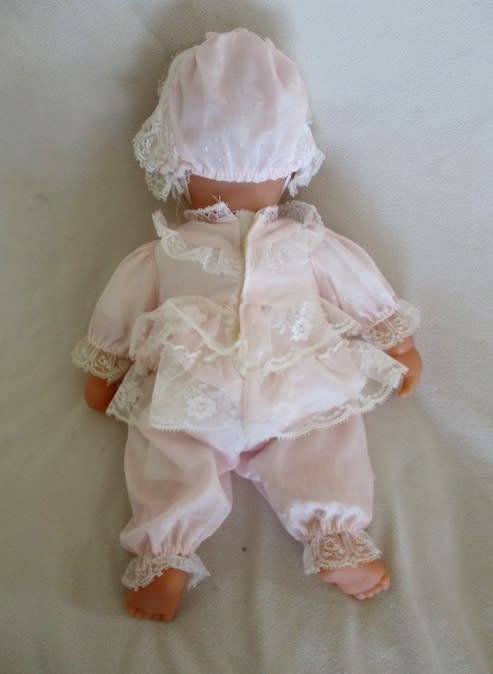 A VERY COLLECTABLE CRYING, GURGLING, COOING BATTAT BABY DOLL WITH OPEN/CLOSE EYES