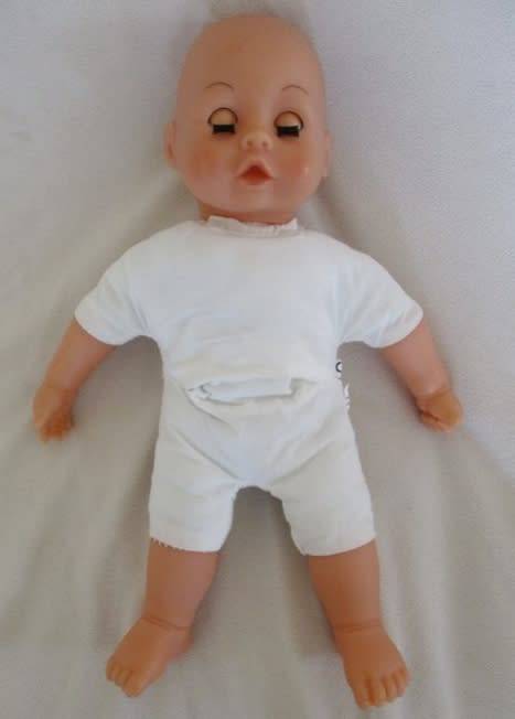 A VERY COLLECTABLE CRYING, GURGLING, COOING BATTAT BABY DOLL WITH OPEN/CLOSE EYES