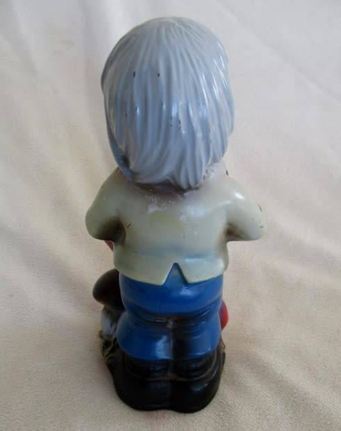 A VERY OLD 19CM TALL VINTAGE HARD RUBBER GNOME CARRYING A CORNUCOPIA OF MUSHROOMS!!