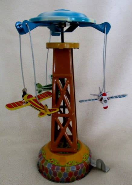 COLLECTABLE RETRO TOYCOMET WIND-UP/LEVER TIN AIRPLANE CAROUSEL WITH BOX