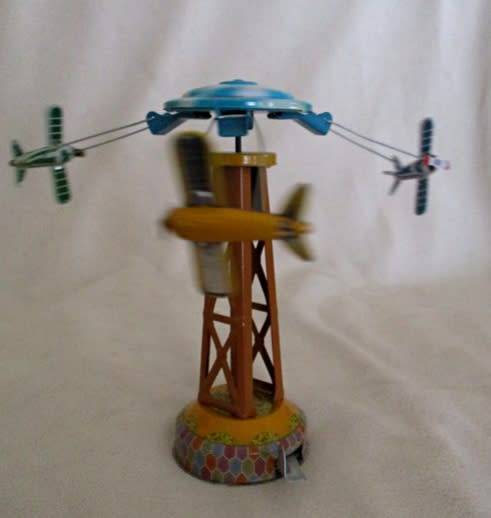 COLLECTABLE RETRO TOYCOMET WIND-UP/LEVER TIN AIRPLANE CAROUSEL WITH BOX