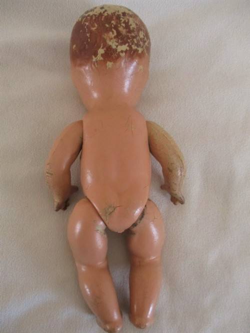 STRAIGHT OUT OF THE ATTIC - AN ANTIQUE COMPOSITION DOLL