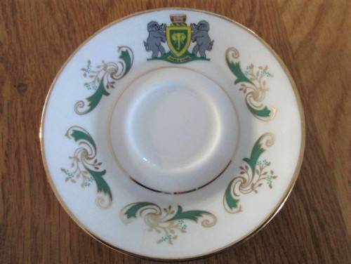 VINTAGE AND HISTORICAL - FORMER HOMELAND VENDA CUP AND SAUCER DEPICTING VENDA COAT OF ARMS