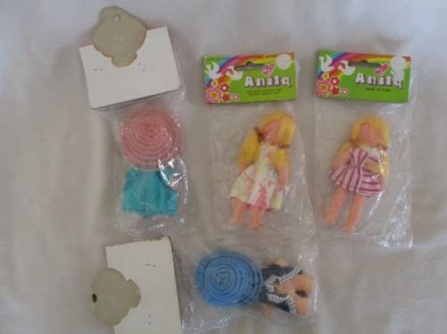 FOUR VINTAGE 1980's DOLLIES STILL SEALED IN ORIGINAL PACKAGING