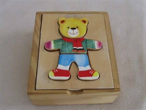 A CUTE WOODEN TEDDY BEAR 'INTERCHANGEABLE' BOX PUZZLE