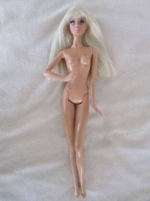 STUNNING MATTEL BARBIE DOLL WITH BANGS AND "REAL" LASHES IN THE CUTEST 1960's STYLE BELL BOTTOMS!