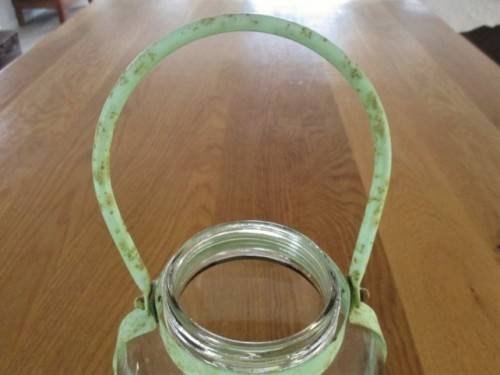 LARGE VERY OLD BOTTLE & PAINTED METAL CANDLE HOLDER TO ADD RUSTIC CHARM TO YOUR KITCHEN OR GARDEN