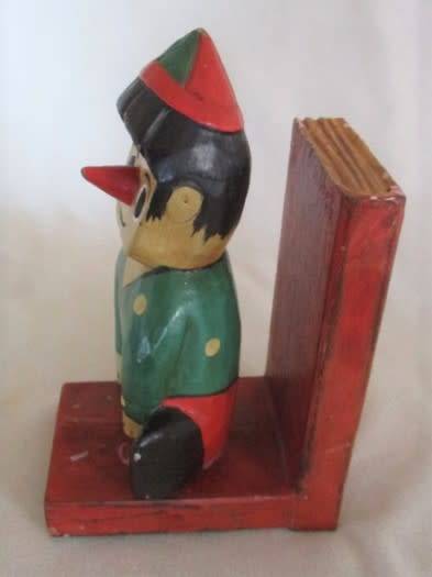 A VINTAGE WOODEN PINOCCHIO BOOK END