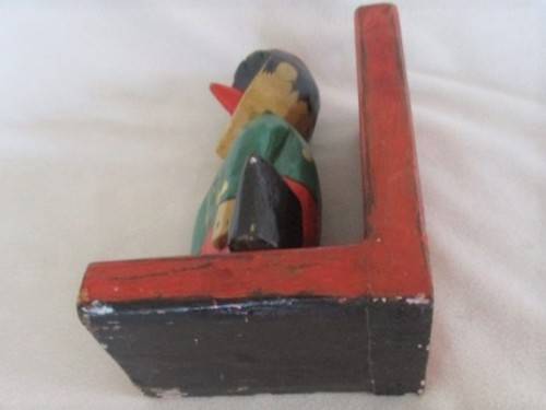 A VINTAGE WOODEN PINOCCHIO BOOK END