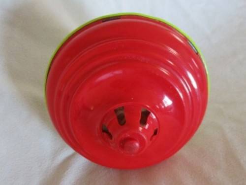 A TINPLATE SPINNING TOP IN GREAT WORKING CONDITION
