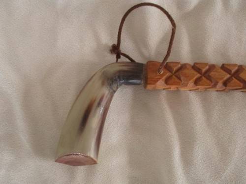 A VINTAGE ORNATELY CARVED, BONE HANDLED WOODEN WALKING STICK