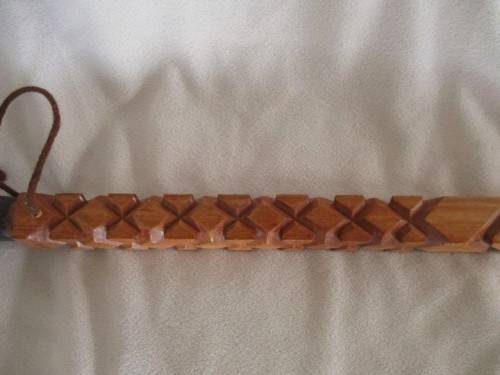 A VINTAGE ORNATELY CARVED, BONE HANDLED WOODEN WALKING STICK