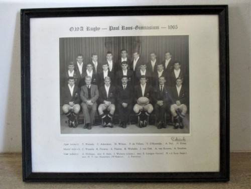 1965 - A VINTAGE FRAMED PHOTO OF A PAUL ROOS GIMNASIUM RUGBY TEAM  (PLEASE DISREGARD REFLECTIONS)