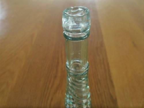 AN UNUSUAL VINTAGE/ANTIQUE BOTTLE