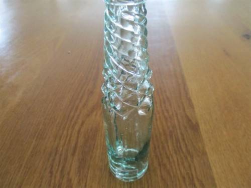 AN UNUSUAL VINTAGE/ANTIQUE BOTTLE