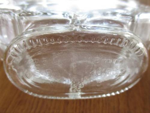 PRETTY AND UNUSUAL -  CANADIAN MAPLE LEAF SHAPED BOTTLE