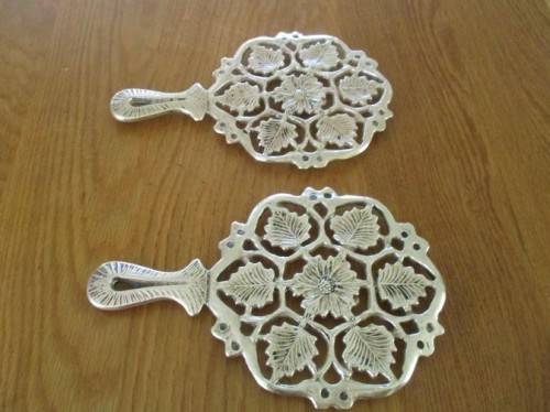 TWO VINTAGE HEAVY, SOLID BRASS TRIVETS/TEAPOT STANDS
