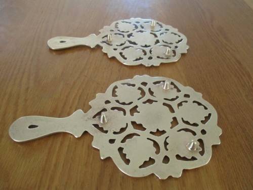 TWO VINTAGE HEAVY, SOLID BRASS TRIVETS/TEAPOT STANDS