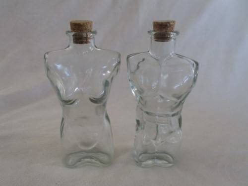 TWO UNUSUAL MALE AND FEMALE TORSO LUTEX GLASS BOTTLES