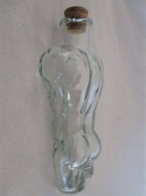 TWO UNUSUAL MALE AND FEMALE TORSO LUTEX GLASS BOTTLES