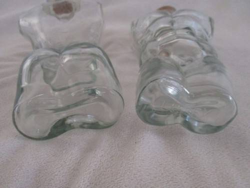 TWO UNUSUAL MALE AND FEMALE TORSO LUTEX GLASS BOTTLES