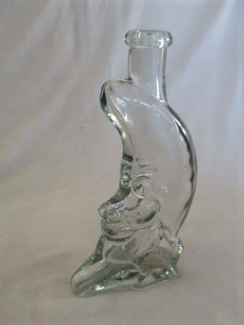 A CUTE CRESCENT MAN-IN-THE-MOON BOTTLE