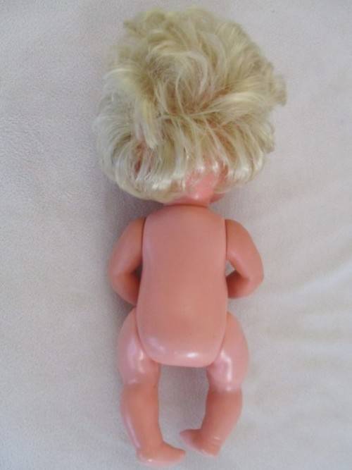 FOR GUNNEMAL ONLY - A CUTE SMALL CHEEKY-FACED DARLING MARKED "SAD" ON BACK OF HEAD