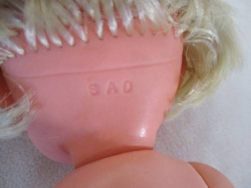 FOR GUNNEMAL ONLY - A CUTE SMALL CHEEKY-FACED DARLING MARKED "SAD" ON BACK OF HEAD