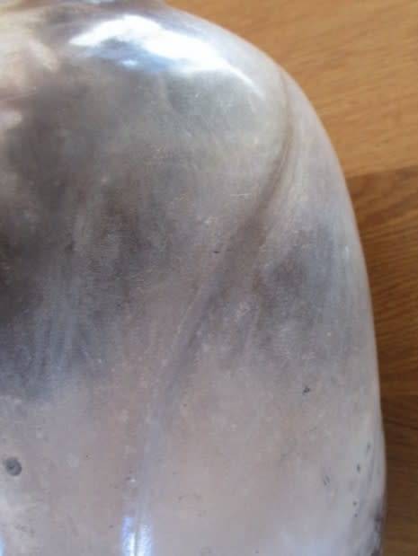 THERE IS SOMETHING SO NOT AVERAGE ABOUT THIS LARGE, HEAVY, BEAUTIFULLY GLAZED VASE