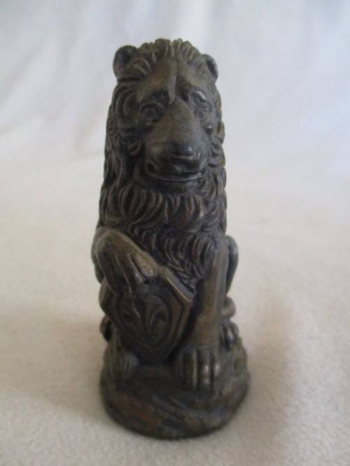 VINTAGE LION HOLDING CRESTED SHIELD