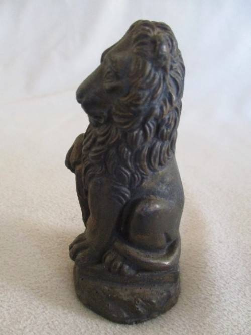 VINTAGE LION HOLDING CRESTED SHIELD