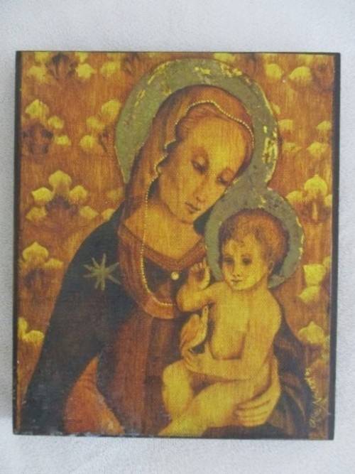 TWO RELIGIOUS ICONS MOUNTED ON WOOD