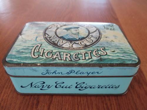 AN OLD JOHAN PLAYERS NAVY CUT CIGARETTE TIN