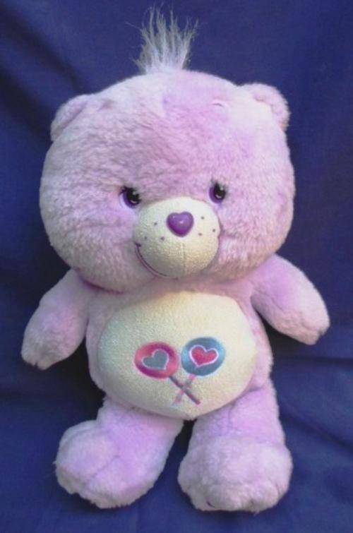 A LOVELY MAUVE CARE BEAR!!
